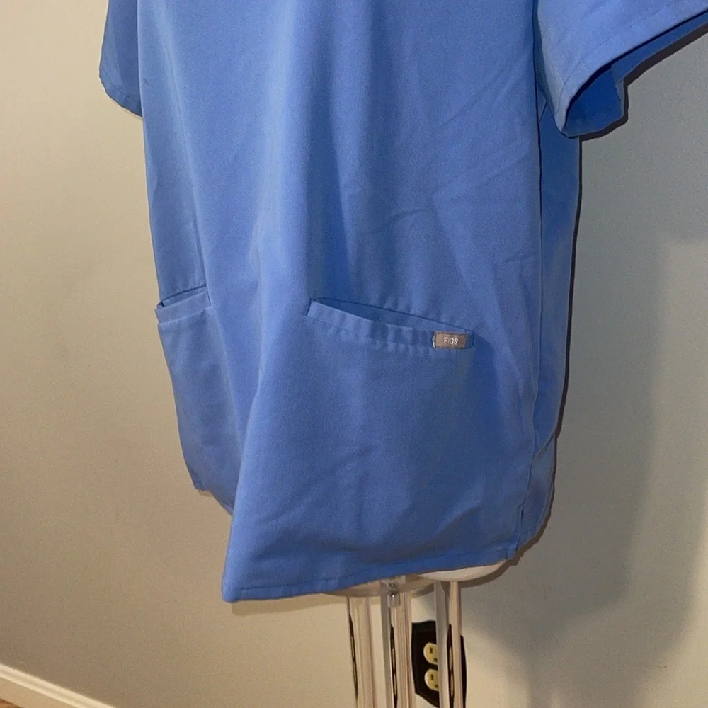 Figs Technical Collection ladies XL Light blue scrub top.